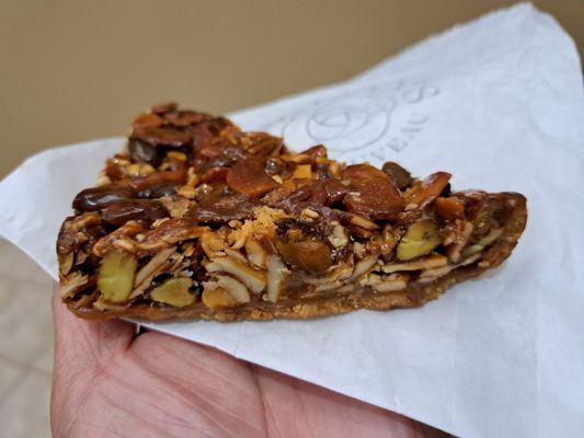 Florentine Cookie is delicious. It seems more like a dessert bar than a cookie.