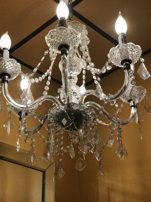 Chandeliers in ladies room