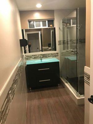 recently completed a new Bathroom with custom shower and frame less glass