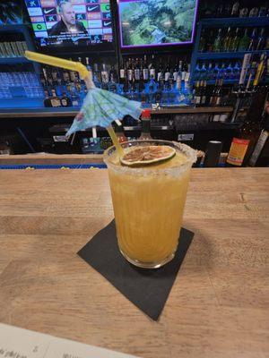 Santi's Skinny: Pueblo viejo Blanco tequila, green mango pulp, passionfruit pupl, lime juice, Fresca soda, & agave.