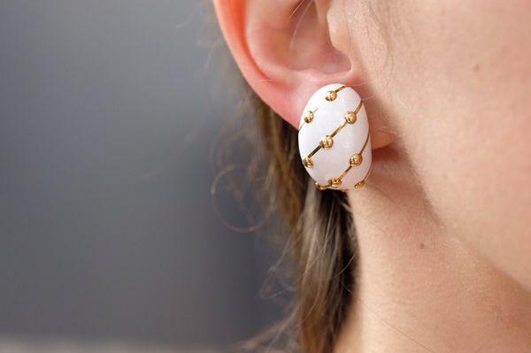 White enamel banana earrings.