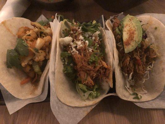 Left to right: Spicy Cauliflower, Chicken Tinga, Cochinita Pibil Tacos ($5 each!)