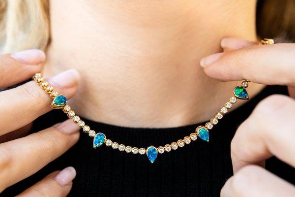 stunningly vibrant pear shaped opal necklace with diamonds