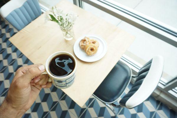 Metropolis coffee and house-made donuts and sunshine.