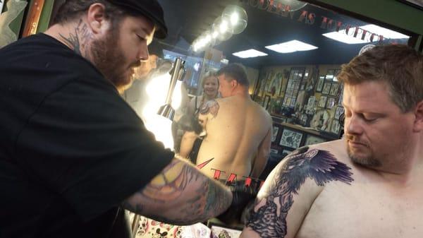 Mike finishing up my tat!