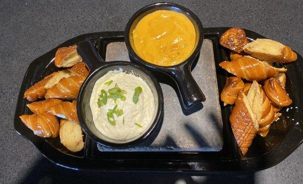 Very buttery, hot and fresh pretzels with cream cheese dip and nacho cheese dip bubbling hot.