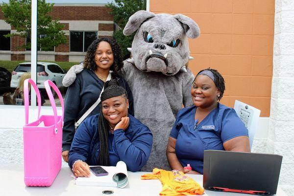 Brutus the bulldog with nursing students