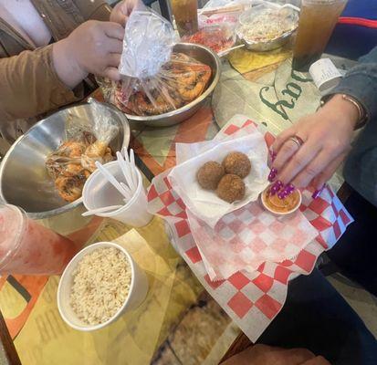 Kings platter with extra pound of shrimp Boudin ball with a side of rice