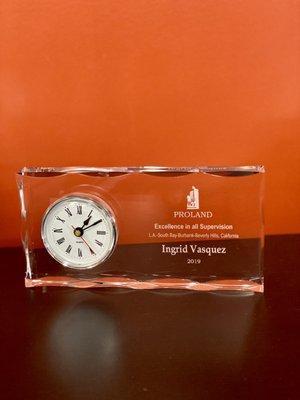 Corporate clock plaque award for our client, Proland, real estate management company.