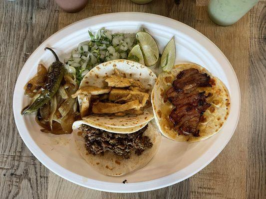 Chicken on top, beef below, Trompo Taco (pork) on right... and the better one.