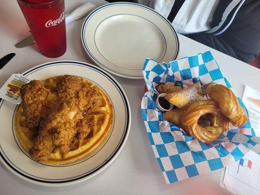 Chicken and Waffles, pastry sampler with lemon glazed cruellers, fruit turnover, croissants with jam on the side.