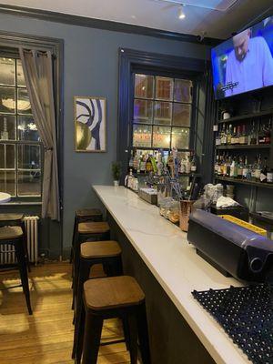 Bar counter with a few stools