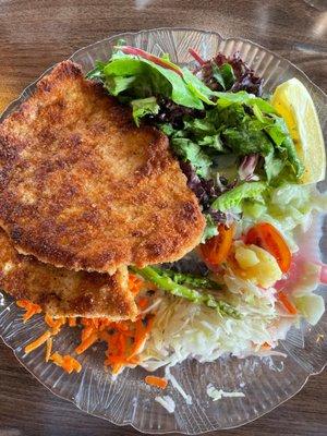 Pork Schnitzel with salad.