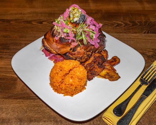 Caribbean style slow-roasted pork, Onion escabeche, sweet plantains, rice & peas.