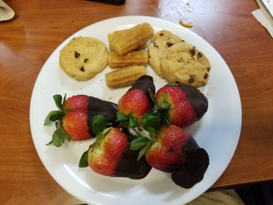 Chocolate covered strawberries, chocolate chip cookies, cheros