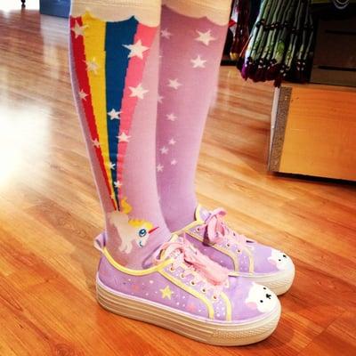 This ModSock customer matches her shoes to her unicorn "Rainbow Blast" knee socks.