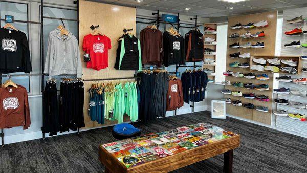 Men's apparel at The Running Well Store in Martin City