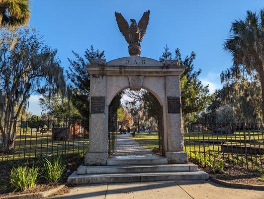 Colonial Park Cemetery on Black Friday, November 24, 2023. Storefront. Entrance at corner of E Oglethorpe Ave and Abercorn St. Landscape.