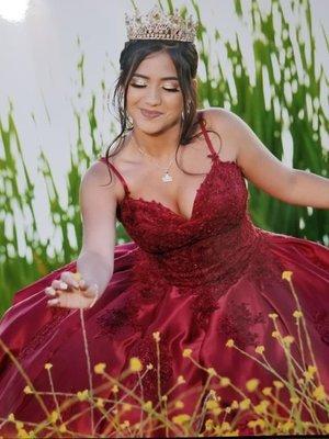 Burgundy Quinceanera Dress with a full circle Gold Crown