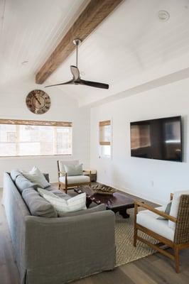 110 year old Reclaimed wood beam from a tobacco barn in Kentucky.  Custom shiplap installed on the walls