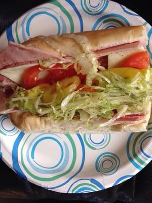 Salami ham cheese lettuce tomato and banana peppers