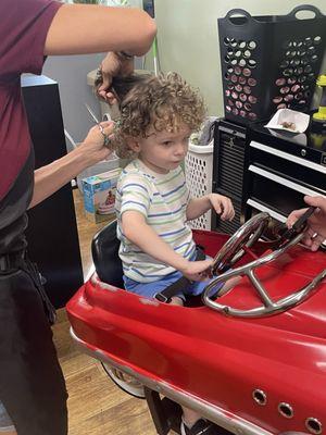 My toddler getting his first ever haircut