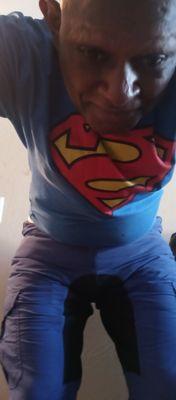 my suoerman shirt and biker shorts.