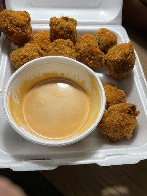 Mushrooms and dipping sauce. The dip went really well and the stuffed mushrooms were great.