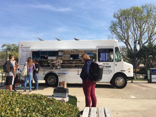 L and T food truck here daily I think (: in front of the financial aid office