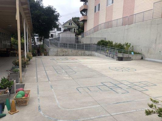 An open area for playing with balls and tricycles.