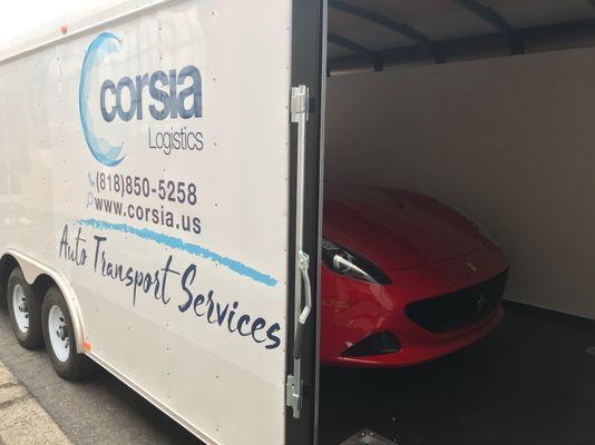 Corsia Logistics single car enclosed carrier