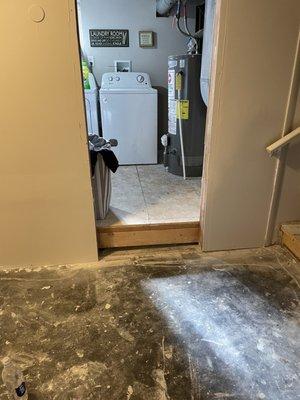 Where there's no frame to laundry room where there was a door.