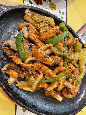 Chicken Fajitas with green pepper, onion, and mushrooms.