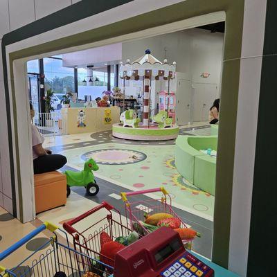 Looking out from the pretend play supermarket area.