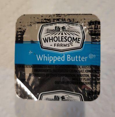 A packet of whipped butter that comes with the bread.