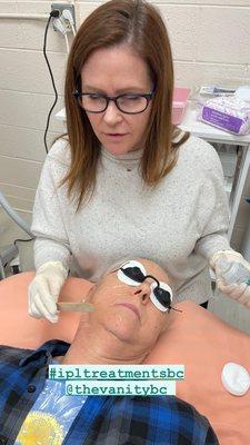 Cindy is prepping client for a ipl treatment. This treatment can be done on your face, neck, chest, & hands.