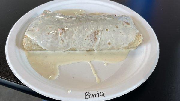 Birria burrito smothered.