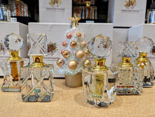 Parfumerie Nasreen Attars are available exclusively in our store. Pure oil scents come in beautiful crystal bottles.