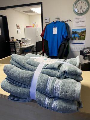 The towels we provided to be embroidered. Front of the office view.