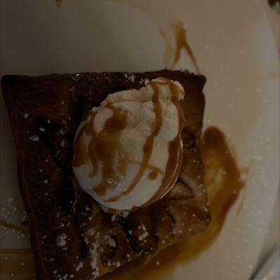 Apple crisp with vanilla ice cream.