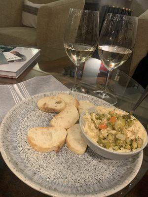 Hummus, bottle of Chardonnay