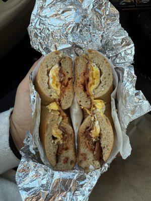 Bacon, egg and cheese on a cinnamon raisin bagel scooped out