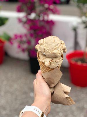 Cookie butter and pistachio ice cream with a waffle cone!