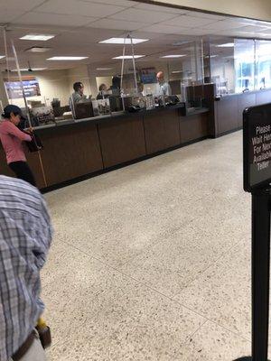 How many employees to watch one teller work?