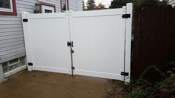 White vinyl double drive gate