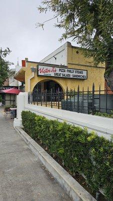 Victor Jr's restaurant, side view from the sidewalk.