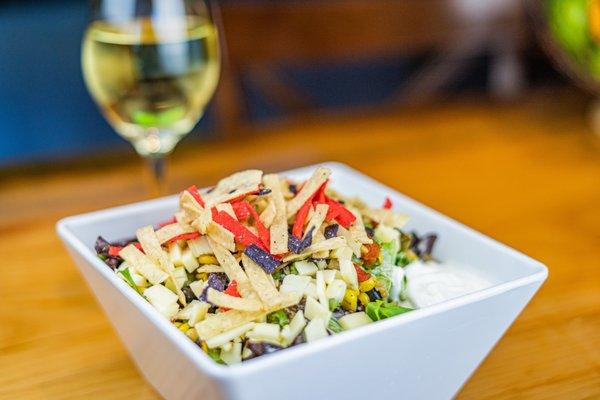 Southwest Salad paired with a glass of Lava Clap Sauvignon Blanc