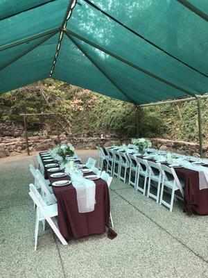 Rehearsal dinner in upper section by waterfall