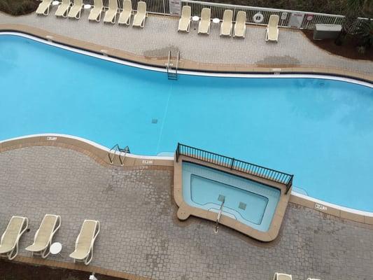 View of one of the pools and hot tub area from 4th fl