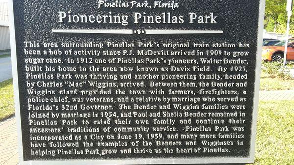 Nearby sign about the founding of Pinellas Park by the rail line